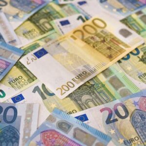 Colorful assortment of Euro banknotes in various denominations, signifying wealth and finance.
